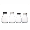 Venta caliente de botellas de jugo de botellas de leche de 350 ml vacías de vidrio con tapas de plástico